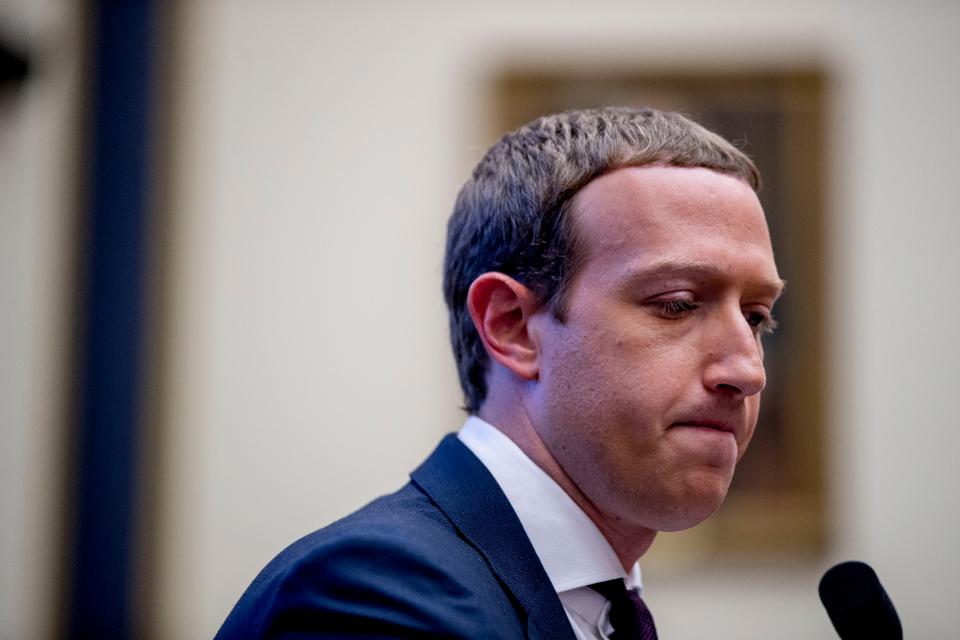 Facebook CEO Mark Zuckerberg pauses while testifying before a House Financial Services Committee hearing on Capitol Hill on Wednesday.