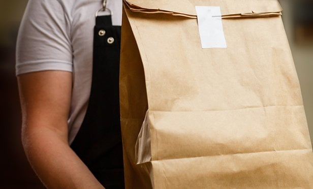 Diverse paper containers for takeaway food.